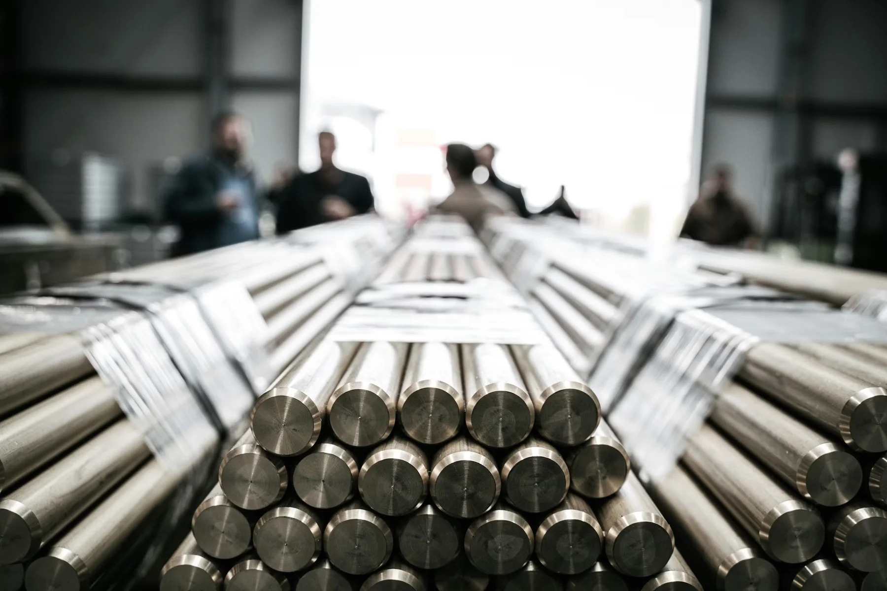 Stacks of aluminium billets in a factory